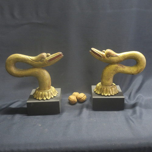 Two swan heads in gilded wood