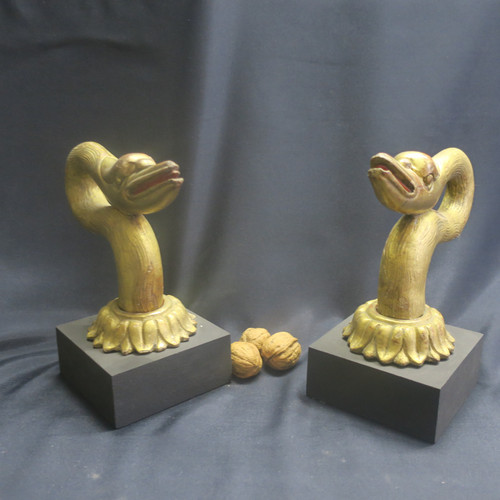 Two swan heads in gilded wood