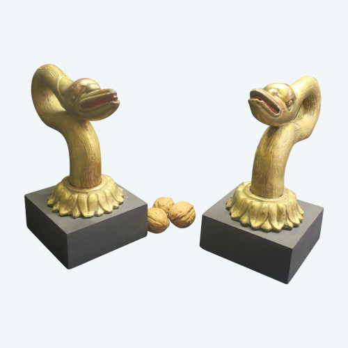 Two swan heads in gilded wood