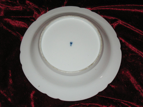 Assiette en porcelaine de Locré à décor floral époque 18ème