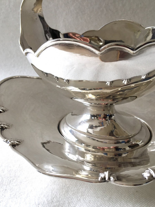 Silver sauceboat in the shape of a shuttle, 19th century