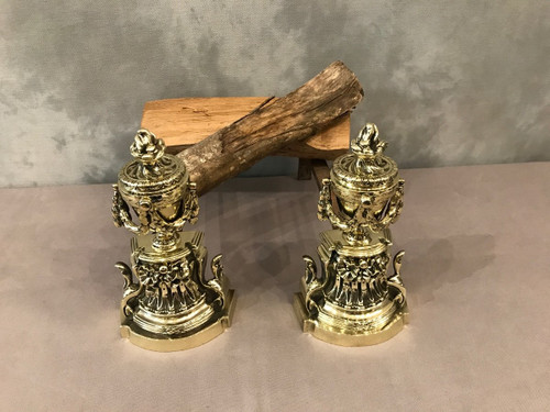 Pair Of Antique Louis XVI Style Polished Bronze Andirons From The 19th Century