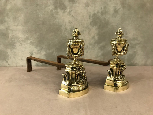 Pair Of Antique Louis XVI Style Polished Bronze Andirons From The 19th Century