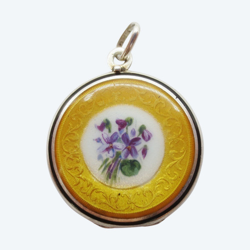 Enameled silver medallion.