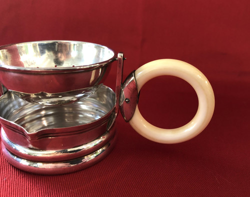 Rocking tea strainer in hallmarked solid silver, ivory handle, late 19th century.