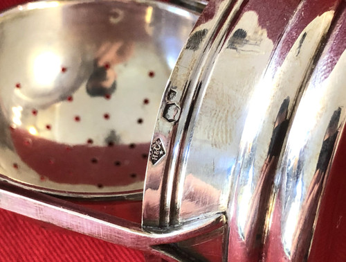 Rocking tea strainer in hallmarked solid silver, ivory handle, late 19th century.