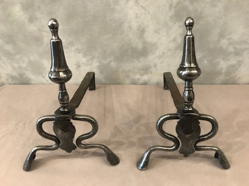 Antique polished iron andirons from the 17th Louis XIV period