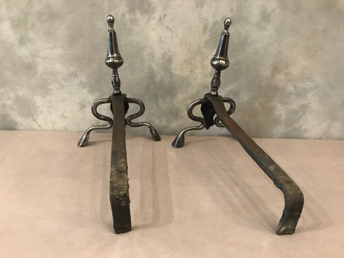 Antique polished iron andirons from the 17th Louis XIV period