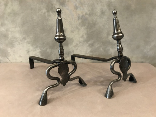 Antique polished iron andirons from the 17th Louis XIV period