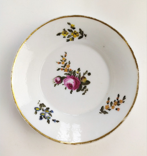 Tazza e piattino in porcellana di Parigi, decorati a mano, XIX secolo
