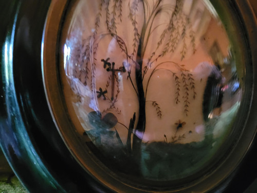 Cadre à décor en cheveux, époque XIXe siècle