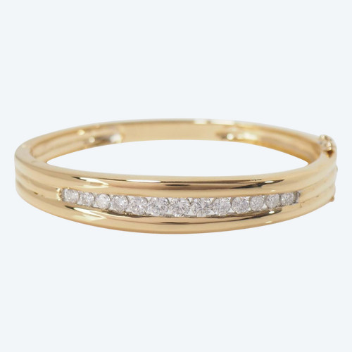 Bracelet jonc ouvrant en or jaune et diamants