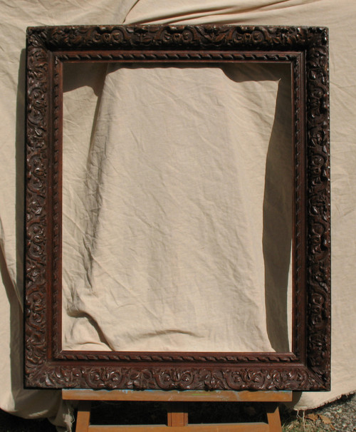 Large early 19th century carved oak frame in the Louis XIII style