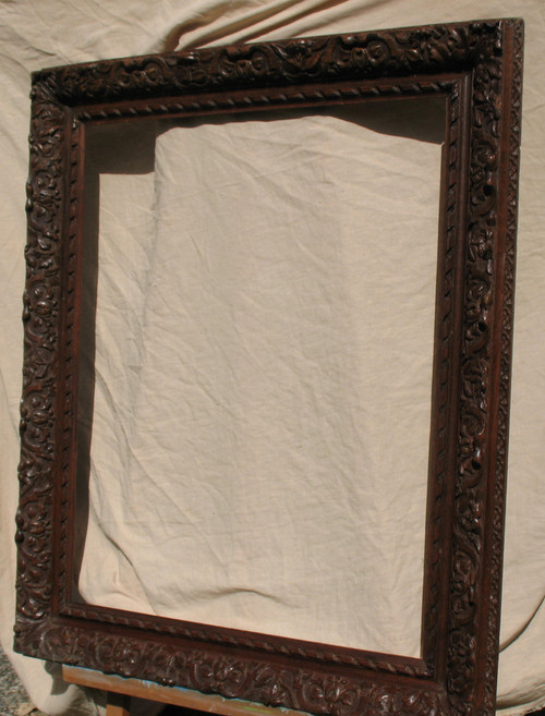 Large early 19th century carved oak frame in the Louis XIII style