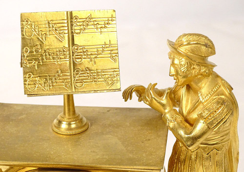 Pendel Bronze vergoldet Troubadour Musiker Flöte Gitarre Delphine XIX.