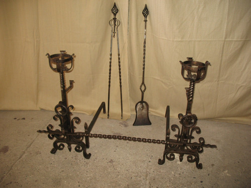 Pair of wrought-iron andirons complete with shovel, tongs and bar, 20th century