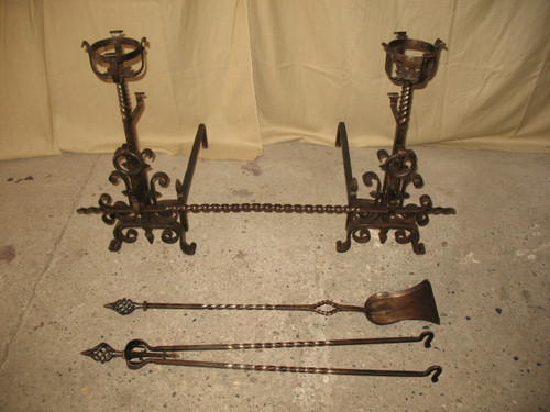 Pair of wrought-iron andirons complete with shovel, tongs and bar, 20th century