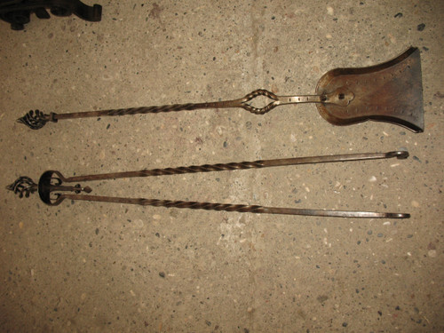 Pair of wrought-iron andirons complete with shovel, tongs and bar, 20th century