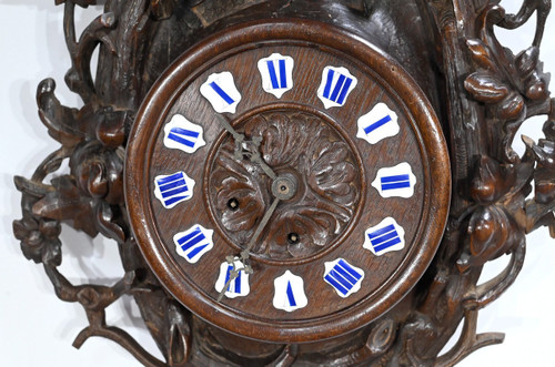 Important Oak clock, Renaissance style - Early 20th century