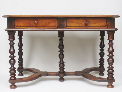 Louis XIII writing table in natural wood.