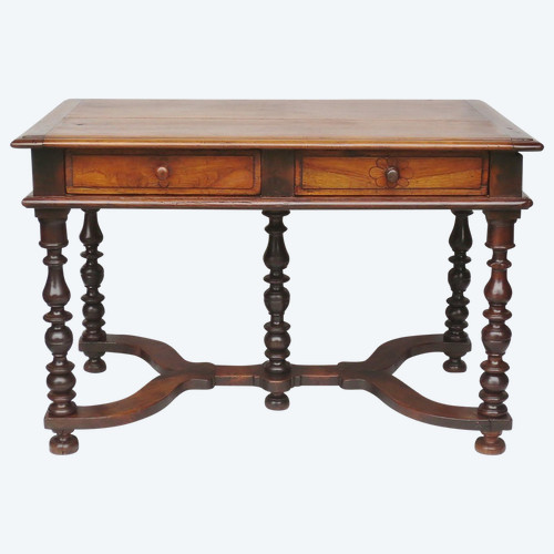 Louis XIII writing table in natural wood.