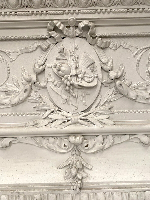 Decorative panel or door top in wood and patinated stucco 19th century