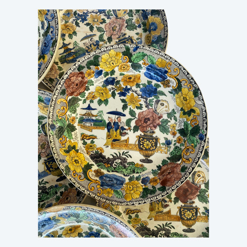 9 polychrome plates in fine earthenware from Montereau, Chinese decor