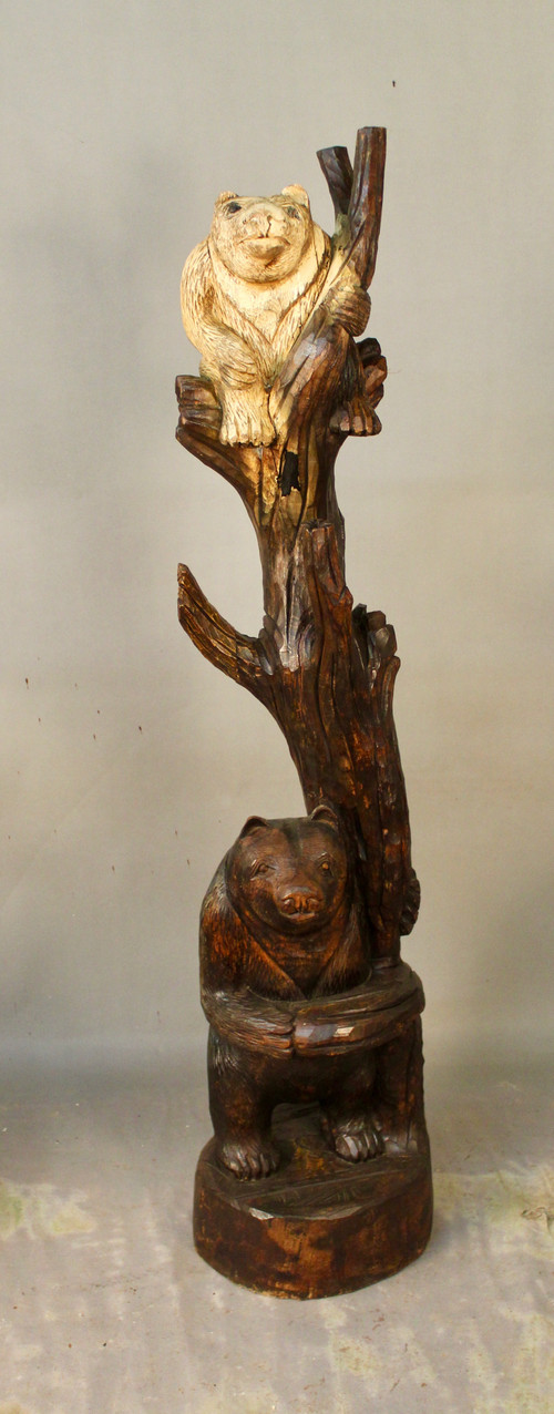 Scultura in legno di 2 orsi su un tronco in stile Brienz
