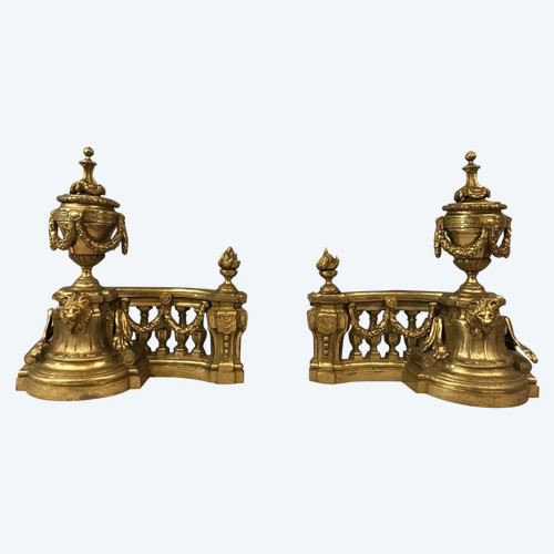 Beautiful old bronze andirons from the 19th century in Louis XVI style