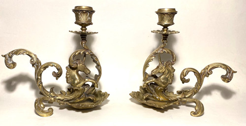 Pair of 19th century bronze candlesticks. Sea unicorns.