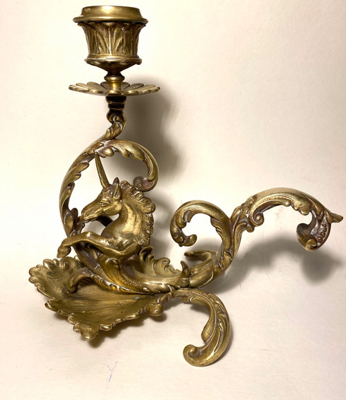 Pair of 19th century bronze candlesticks. Sea unicorns.