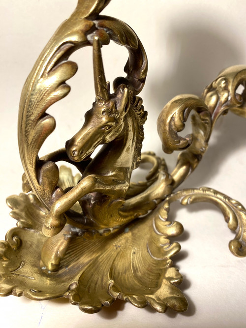 Pair of 19th century bronze candlesticks. Sea unicorns.