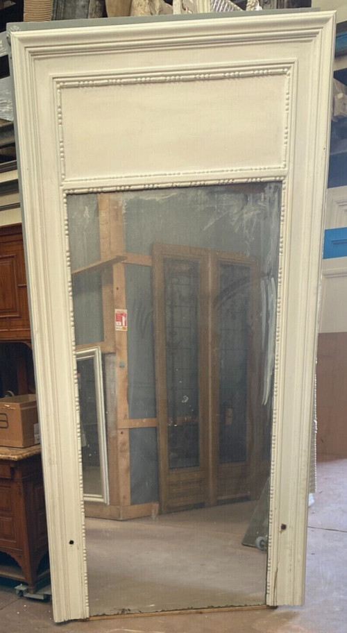 Louis XVI style mirror in wood and patinated stucco XX century