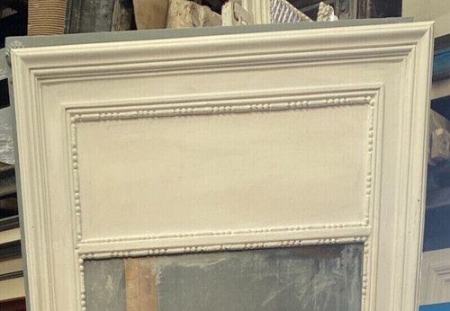 Louis XVI style mirror in wood and patinated stucco XX century