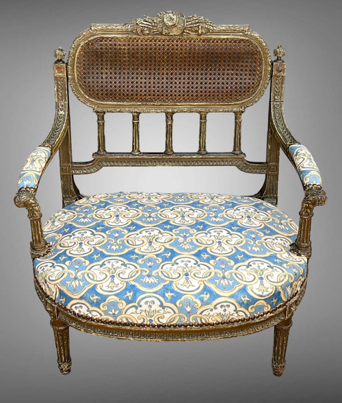 FAUTEUIL " DIT MARQUISE " DE STYLE LOUIS XVI EN BOIS PATINÉ ET SCULPTÉ DU XIXe