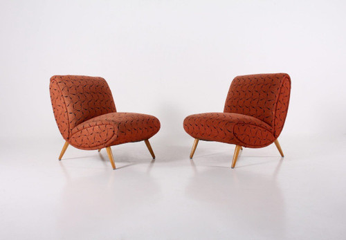 Two Low Chairs and an Ottoman Norman Bel Geddes