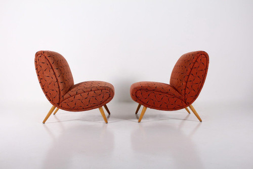Two Low Chairs and an Ottoman Norman Bel Geddes