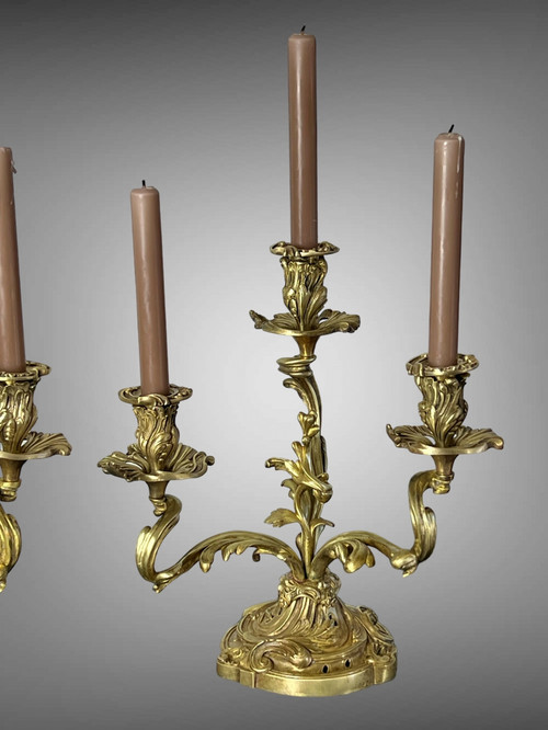 PAIR OF NUMBERED THREE-BRANCH GILT BRONZE CANDLE HOLDERS IN LOUIS XV STYLE