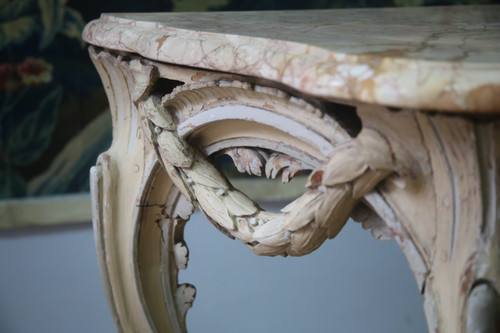 Large console in carved and cream-colored basswood from the Louis XV period