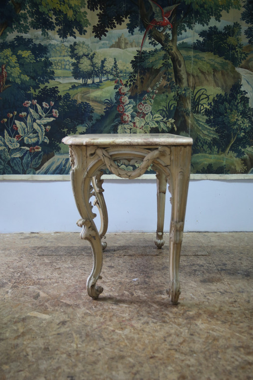 Large console in carved and cream-colored basswood from the Louis XV period