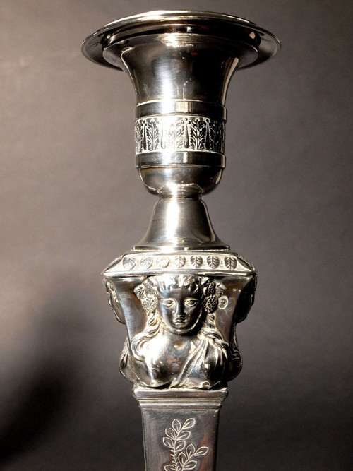 Pair of candlesticks in solid silver, with the count's coat of arms, by Denis Garreau