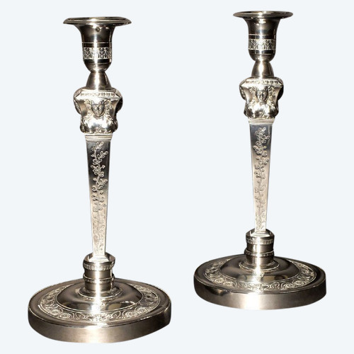 Pair of candlesticks in solid silver, with the count's coat of arms, by Denis Garreau