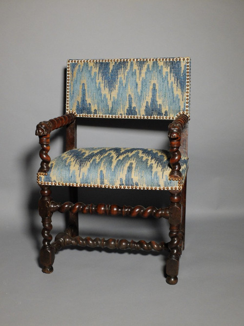 Louis XIII period armchair with lion's muzzles