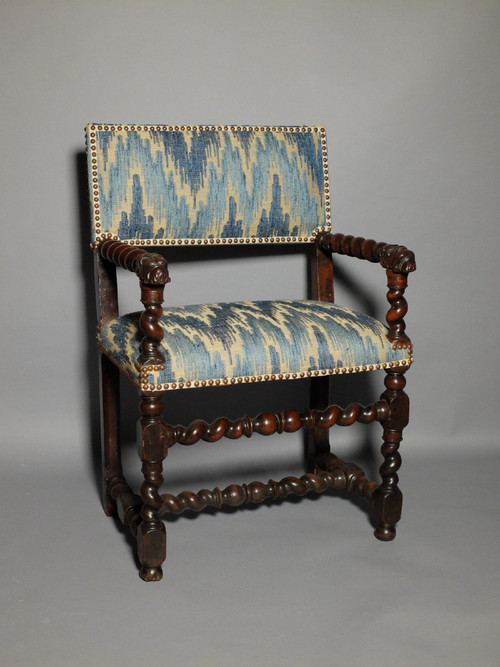 Louis XIII period armchair with lion's muzzles