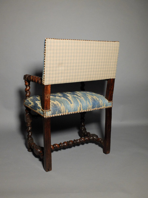 Louis XIII period armchair with lion's muzzles