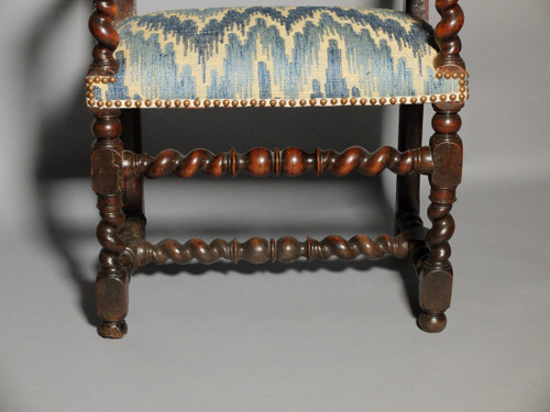 Louis XIII period armchair with lion's muzzles