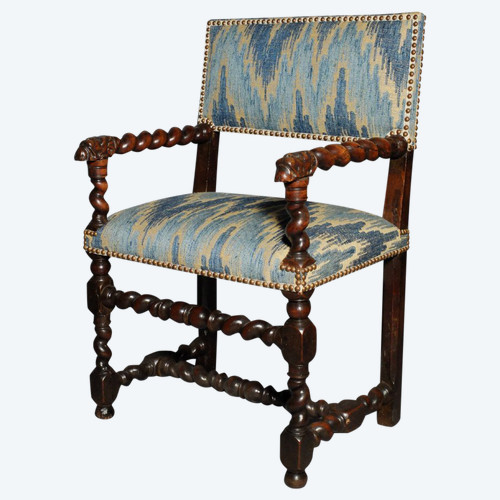 Louis XIII period armchair with lion's muzzles