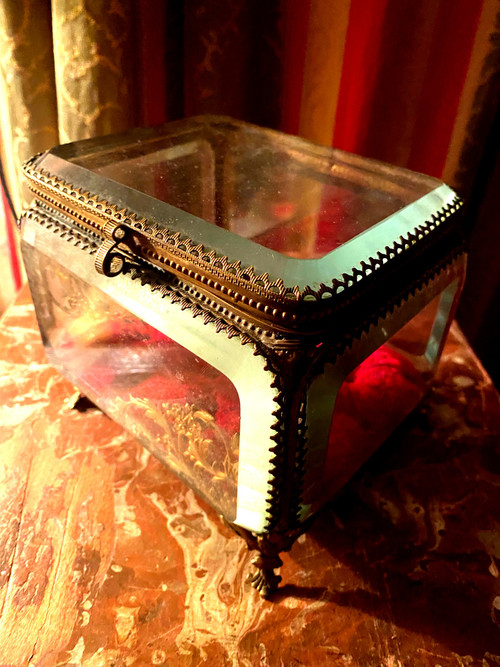 Large Napoleon III period beveled crystal jewelry box with chased bronze frame on all sides.