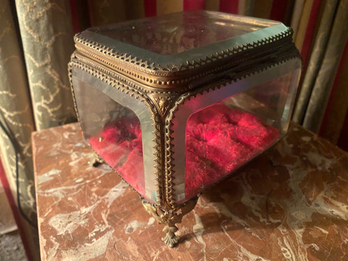 Large Napoleon III period beveled crystal jewelry box with chased bronze frame on all sides.