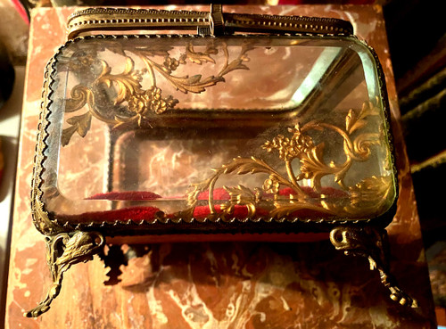Large Napoleon III period beveled crystal jewelry box with chased bronze frame on all sides.